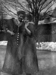 Two women posed in winter scene