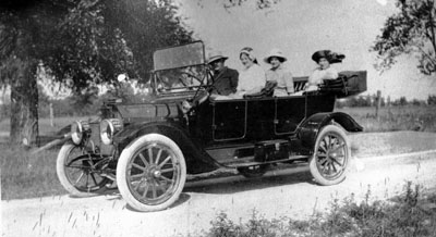 Man and three women in car