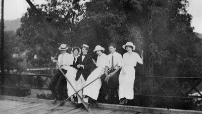 Group of people on bridge in Gassaway, W. Virginia