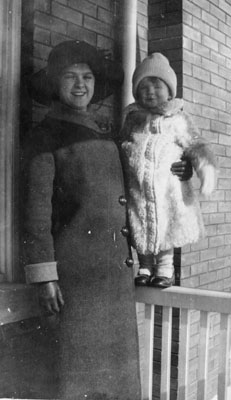 Woman and small boy on porch