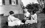 Three women with pets