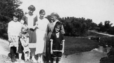 Front - Murray and Spotty, Margaret  McKie, Back - Doris Freeman, Eileen Harrison, Helen McKie, Mrs. F. C. Willmott.