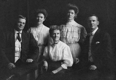 Mrs. J. E. Harrison and family