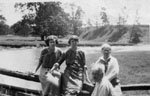 Connie Hunter, Aggie, Gussie and Fred Willmott at bridge in flats, "Rose Hill" farm.