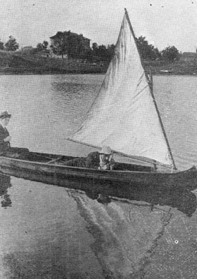 Skiff sailing on the pond.  Milton, Ont.