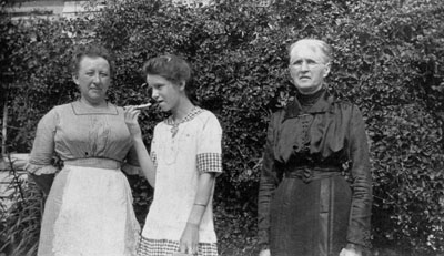 Three generations of women posed together