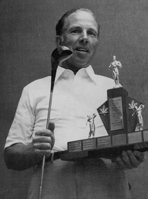 Bill Gallinger, Gallinger Motors, with golf trophy.