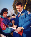 Chris Hadfield, astronaut, signing autographs in Milton