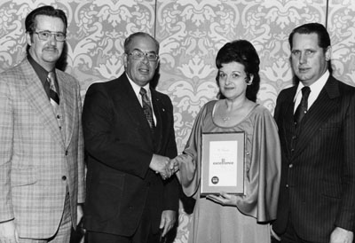 Olive and Gordon Krantz receiving award