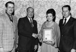 Olive and Gordon Krantz receiving award