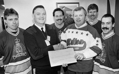 Bob Lee (with cheque)