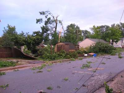 Storm damage at the house on the corner of Oak Street and Bruce Street.