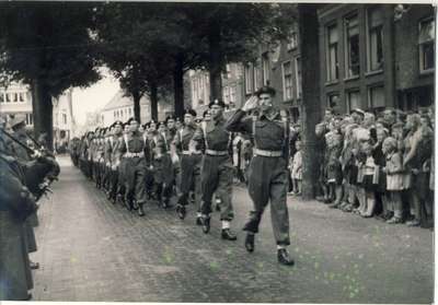 Ontario Tank Regiment leads Victory Parade into a Dutch town.