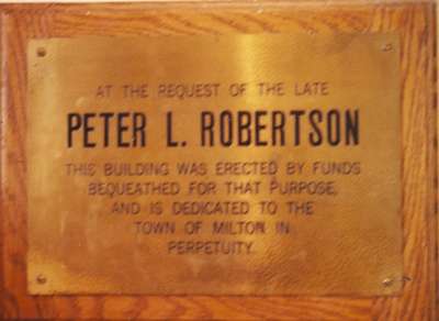 Memorial plaque on the public washrooms funded by P. L. Robertson's will.