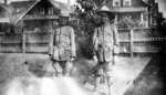 Two boys in soldiers' uniforms