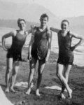 Three young men in bathing suits