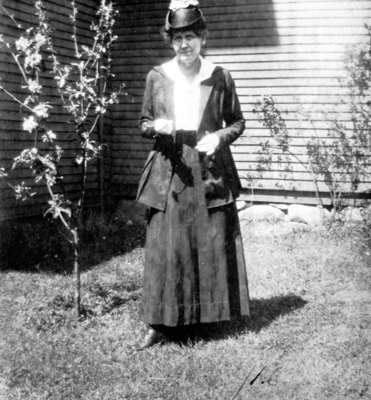 Woman standing in garden