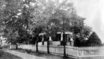 House with white picket fence