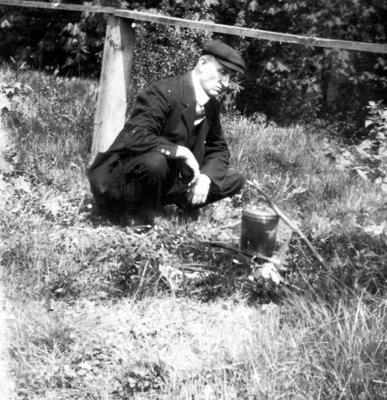 Man attending camp fire