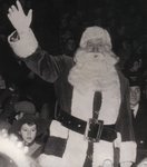 Santa Claus waves to the crowd at the 1953 Milton Santa Claus Parade
