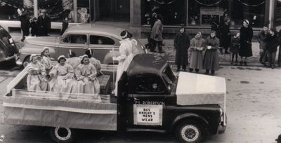 &quot;Bus Knight's Mens Wear&quot; float in the Santa Claus Parade