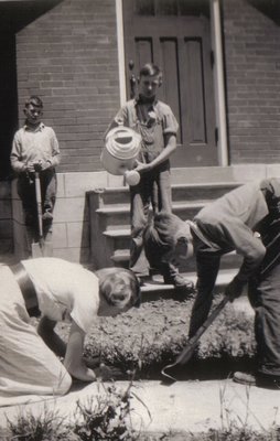 Students planting flower beds at Ash School