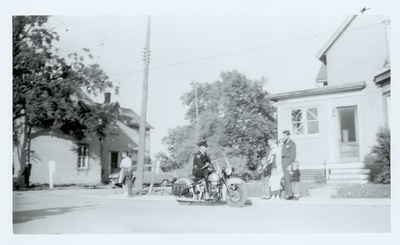 Ray Waters and family in front of their home