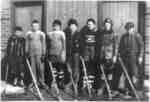 Hockey players outside Brown Street Arena