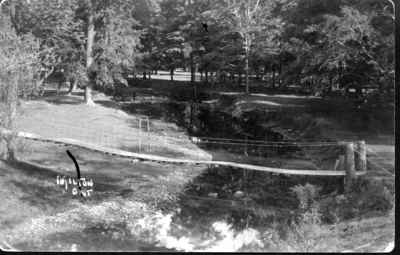 Swing bridge crossing the 16th Mile Creek