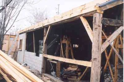 Wall of the Waldie Blacksmith Shop under reconstruction