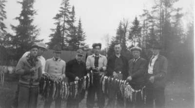 Group of men at fishing camp