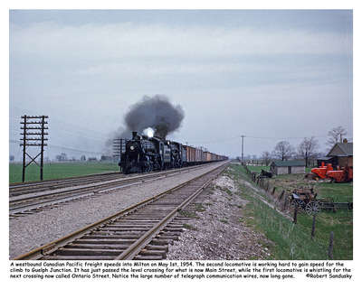 Westbound CP freight speeds into Milton