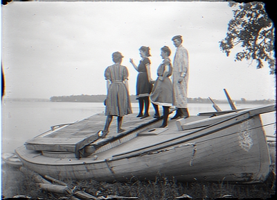 3 women 1 man on boat