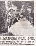 Mrs. Tomasello and Sons Placing memorial wreath