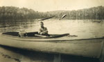 Hughie Bell in his Delivery Boat, Back Bay, circa 1915