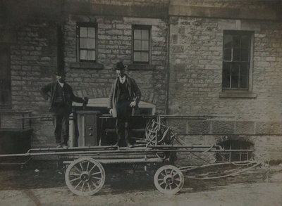 Men posing in front of old fire station in Niagara-on-the-Lake.