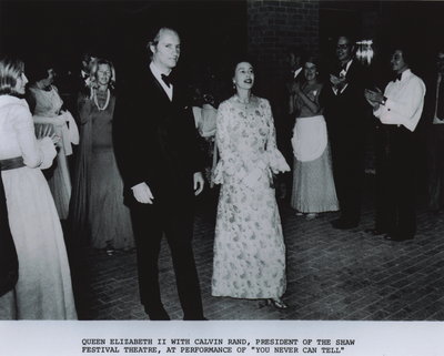 Queen Elizabeth II with Calvin Rand, President of the Shaw Festival Theatre, at performance of &quot;You never can tell&quot;