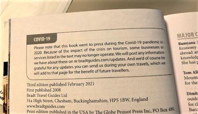 New library book with COVID-19 disclaimer