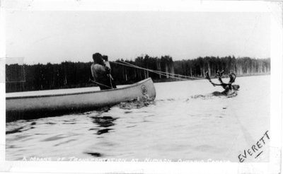 Nipigon, caribou pulling canoe.