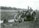 Plowing with steel wheeled tractor