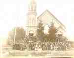 Norwich Baptist Church with gathering in front.