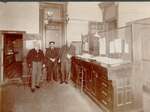Men Standing by a vault in the new Woodstock Court House