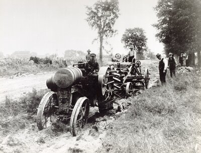 Men Working on road with Tractor