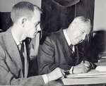 Don Pratt and J.N. Meathrell in the County Road Office