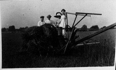 Group of people with grain binder, Norwich