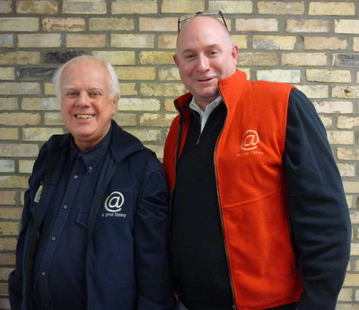 Jefferson Gilbert and Larry Moore in &quot;vintage&quot; Super Conference volunteer vests