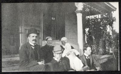 Chisholm family on steps of old farm house on Dundas St. (Oakville)