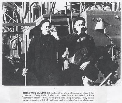 Two sailors drinking Coca Cola on HMCS OAKVILLE