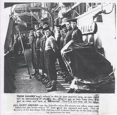 Cleaning crew aboard HMCS Oakville