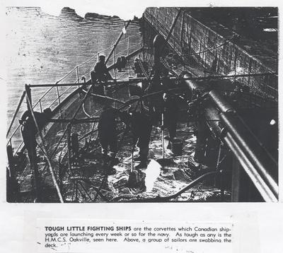 Sailors scrubbing HMCS OAKVILLE deck